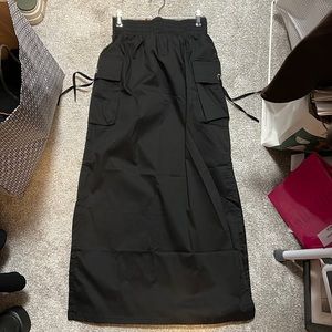 Size small, maxi cargo skirt with slits. Never worn! Tags on
